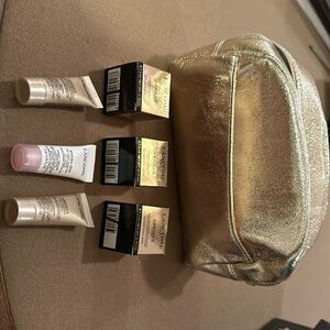 Lancôme cosmetic bag with 3 Absolue soft creams, 2 Absolue serums and Hydra Zen.